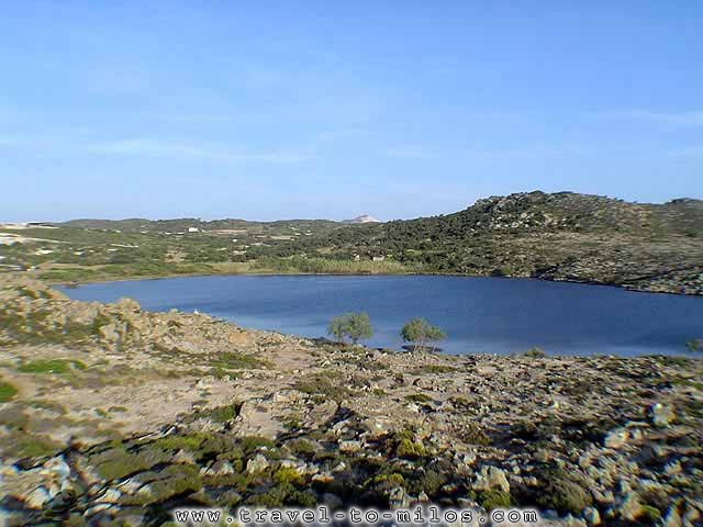 The panoramic view of Achivadolimni. Splendid, very big sandy beach. In the small lake, that loses almost all the water in August, is owed also the name of beac  